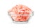 Pink Himalayan rock coarse salt in glass transparent bowl isolated on white background