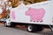 A pink hippo Party Rental truck