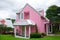 Pink house in forest