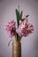 Pink hyacinth flower in homemade vase