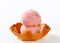 Pink ice cream in waffle basket