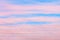 Pink Ñirrus clouds blue sky background closeup, red dawn cirrostratus cloud texture, purple evening sunset morning sunrise clouds