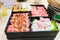 Pink kamaboko sliced, japanese fish cake, pork belly sliced and