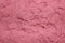 Pink kinetic sand top view. Pink sand. Kids toys