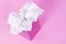 Pink kleenex style soft paper tissue box, copy space