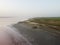 Pink Koyashskoye salt lake in Krym and Black Sea coast. Aerial view.