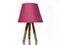 Pink lampshade with wooden legs. pink colored night light