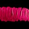 Pink lipstick brush stroke texture isolated on black background