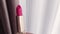 Pink lipstick in golden tube as luxury cosmetic product, make-up and beauty