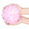 Pink loofah in hand