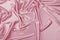 Pink luxury satin fabric texture for background