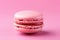 Pink macaroon on pink background