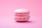 Pink macaroon on pink background