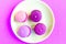 Pink macaroons on the plate