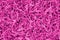 Pink and magenta shredded paper packaging material background