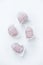Pink marshmallows, handmade sweets, zephyr, soft confectionery, candy on a light background. Sweet marshmallow.