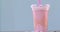 Pink milkshake plastic cups takeaway