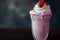 Pink milkshake with raspberries and whipped cream, indulgent treat