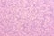 Pink mineral background. Decorative coating on the wall.
