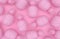 Pink monochrome pineapples on a pink background. Texture in pastel colors. Tropical exotic fruit. 3D rendering.