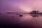 Pink morning view of the lake frog sunrise in Carcans Maubuisson in water winter day