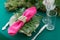 Pink napkin with a patterned clip. table setting. Wedding decor in the magic forest for a loving couple. Pink and green