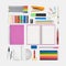 Pink notebook and school or office tools on white background