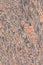 Pink orange black Indian flat granite texture background