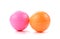 Pink and orange Miniature Golf Ball On White Background