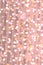 Pink orange pastel glitter background, lens bokeh effect