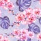 Pink orchid flowers with outlines and large monstera leaves on light lilac background. Seamless floral tropical pattern.