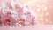 Pink orchids bouquet on light peach background with glitter and bokeh. Banner with copy space. Perfect for poster