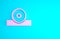 Pink Otolaryngological head reflector icon isolated on blue background. Equipment for inspection the patients ear