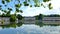 The pink palace Benrath is reflected on the mirror-like surface of the lake, Dusseldorf, Germany