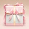 Pink paper and ribbon wrapped present.