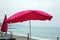 Pink Parasol By The Sea