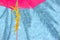 Pink parasol yellow starfish turquoise blue pool