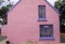 Pink pastel house in Ardgroom Village, Cork, Ireland