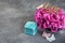 Pink peony, mint gift box and butterflies