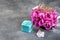 Pink peony, mint gift box and butterflies
