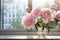 A pink peony by a sunlit window, offering copy space
