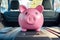 Pink piggy bank in car interior, vehicle purchase, insurance or driving and motoring cost. Money box in new car