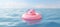 Pink piggy bank half submerged in blue water with debt, bankruptcy, and loss of money concept