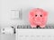 Pink piggy bank saving electricity and heating costs