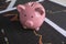 Pink piggy bank with stock graph, step up growing business to success and saving for retirement concept