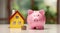 Pink piggy bank with white wooden house with coins. Concept for financial home loan or money saving for house buying. Generative