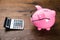 Pink Piggybank And Calculator