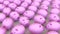 Pink Piggybanks in an Even Grid on a Simple Concrete Surface