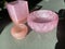 Pink plastic resin containers