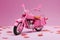 Pink play bike. Small motorcycle model for dolls. The concept of women's transport.